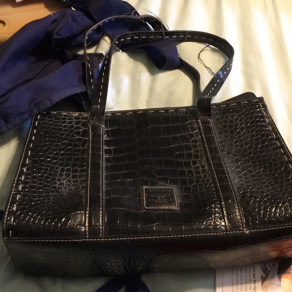 Black alligator-like handbag
